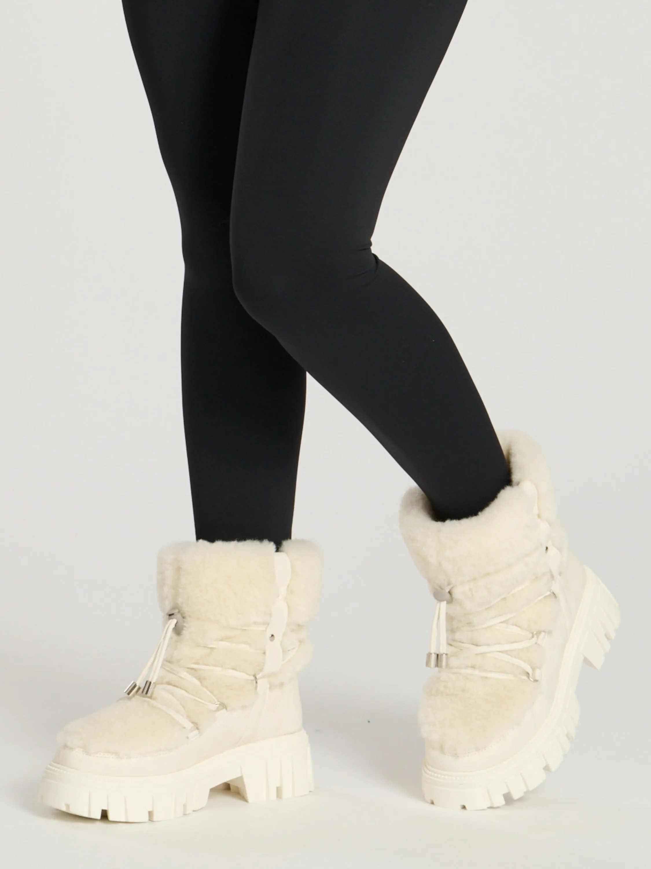 The 'Arctic' faux fur chunky lace up snow boots in vanilla