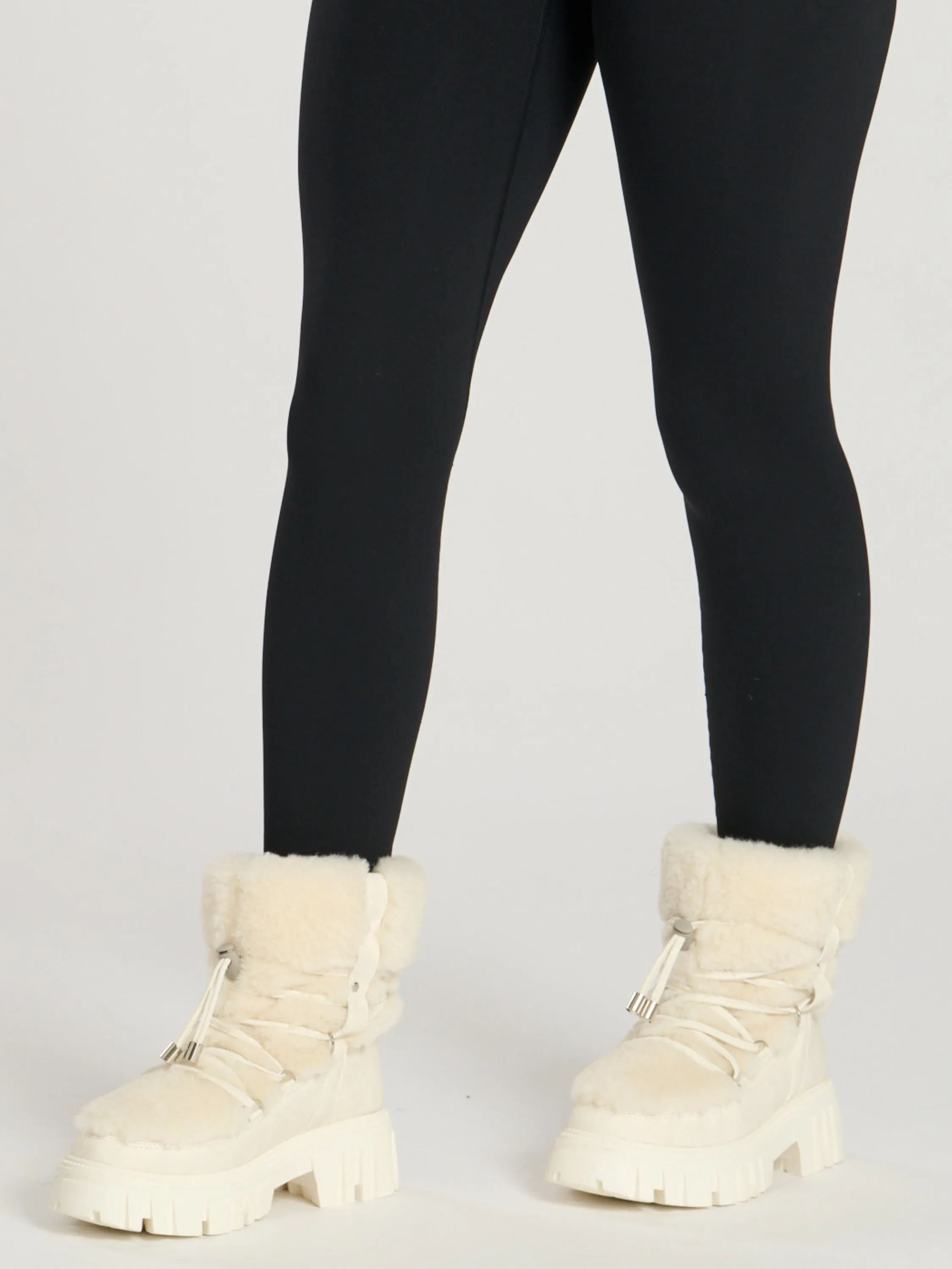 The 'Arctic' faux fur chunky lace up snow boots in vanilla